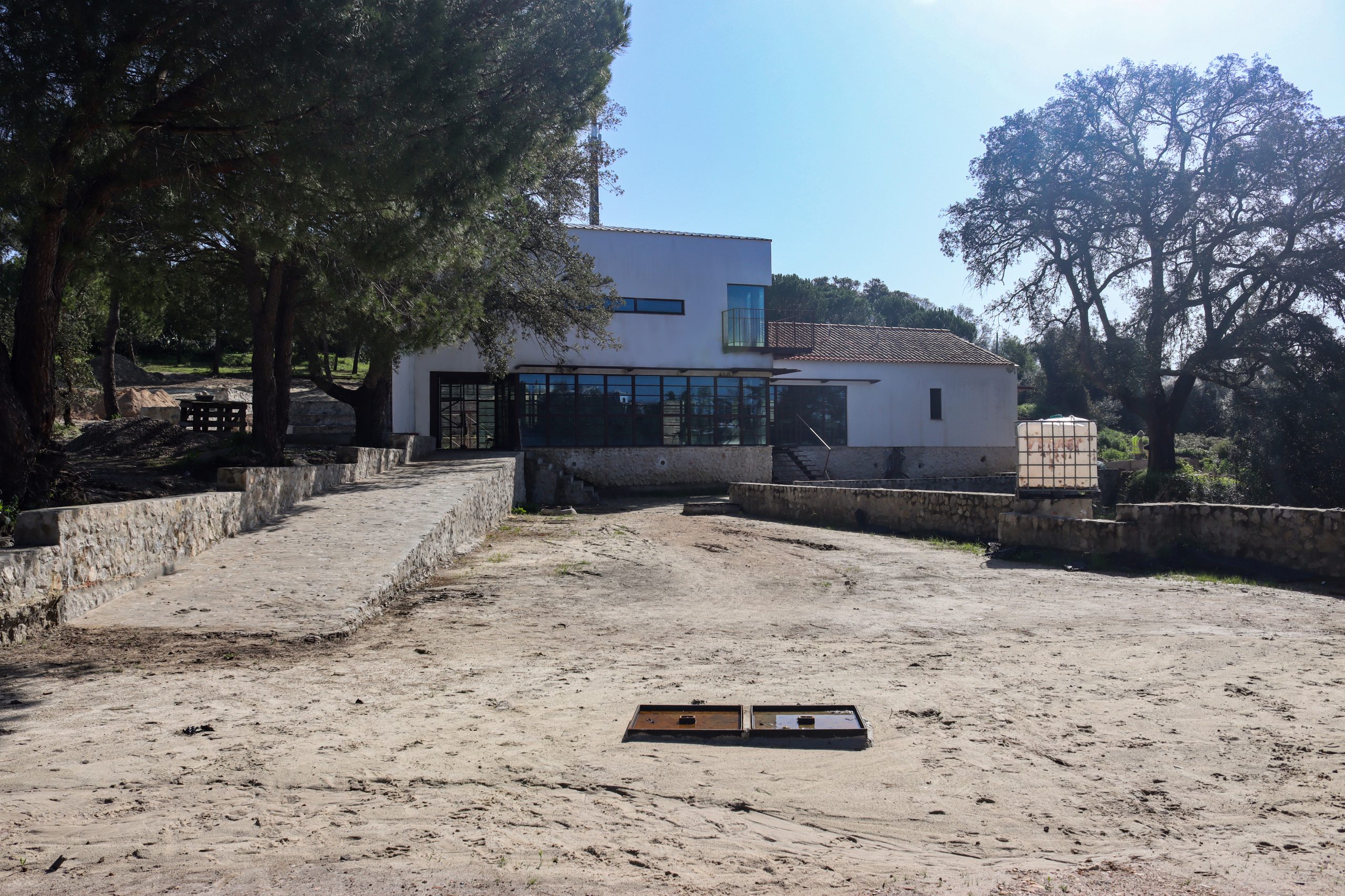 Former Factory Retreat — After: Outdoor living and gathering spaces