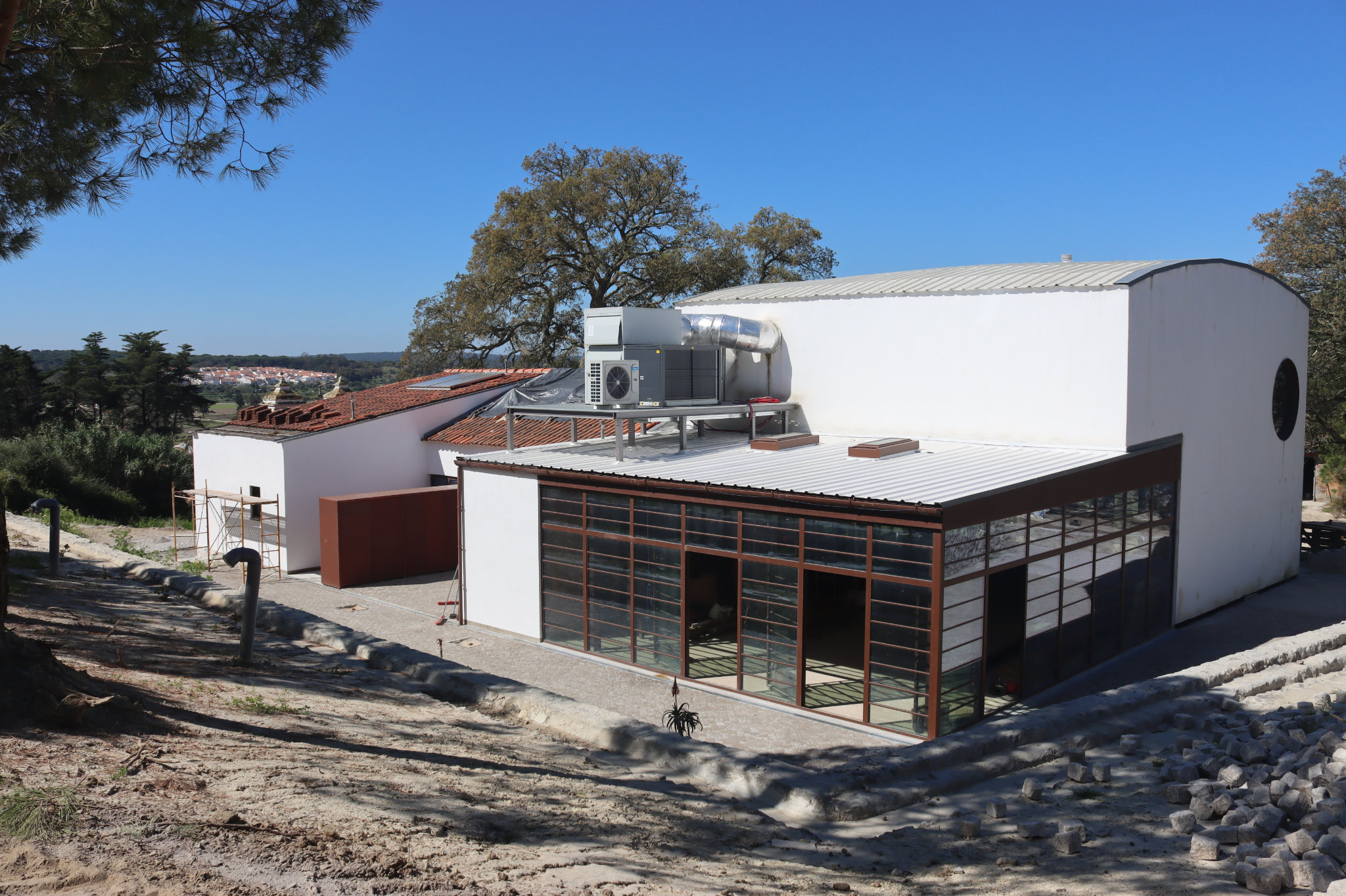 Former Factory Retreat — After: Outdoor plazas and landscape integration