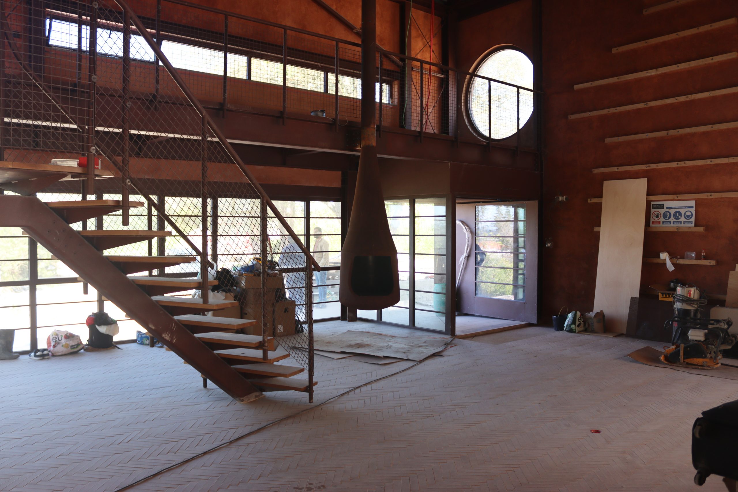 Former Factory Retreat — After: Light and crafted earth materials